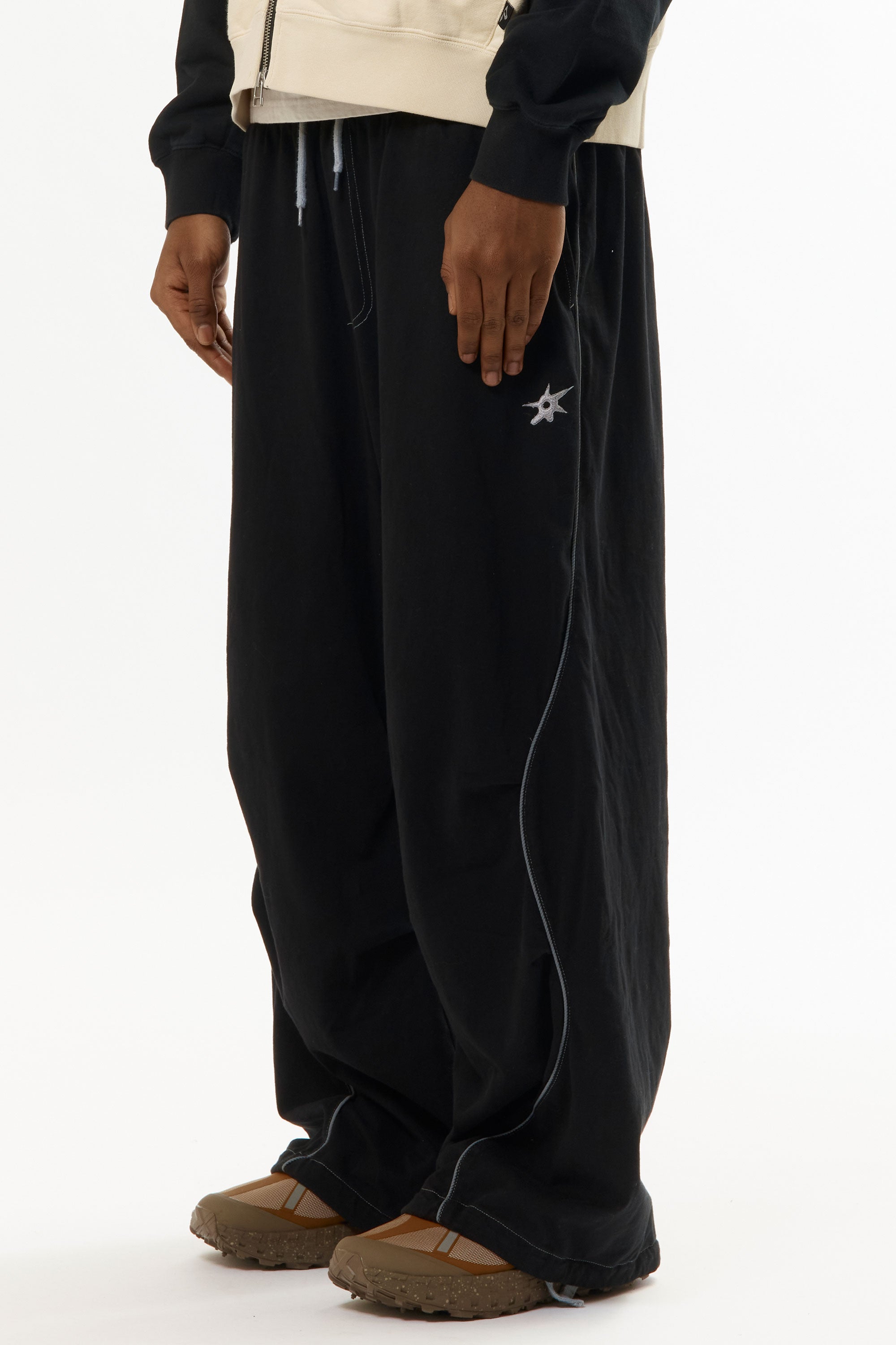 The ILLUSIONISTS PANTS OVERDYE BLACK available online with global shipping, and in PAM Stores Melbourne and Sydney.
