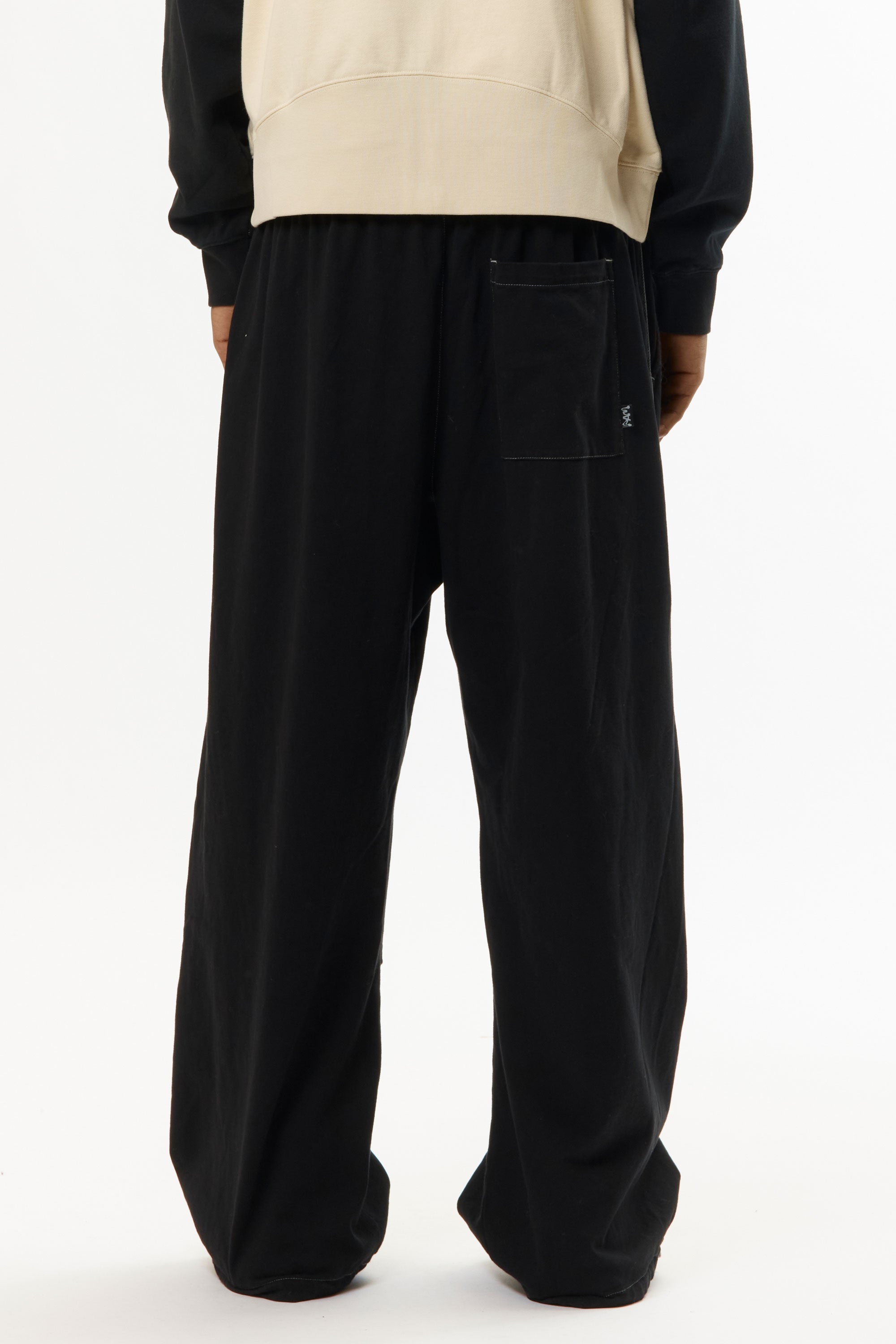 The ILLUSIONISTS PANTS OVERDYE BLACK available online with global shipping, and in PAM Stores Melbourne and Sydney.