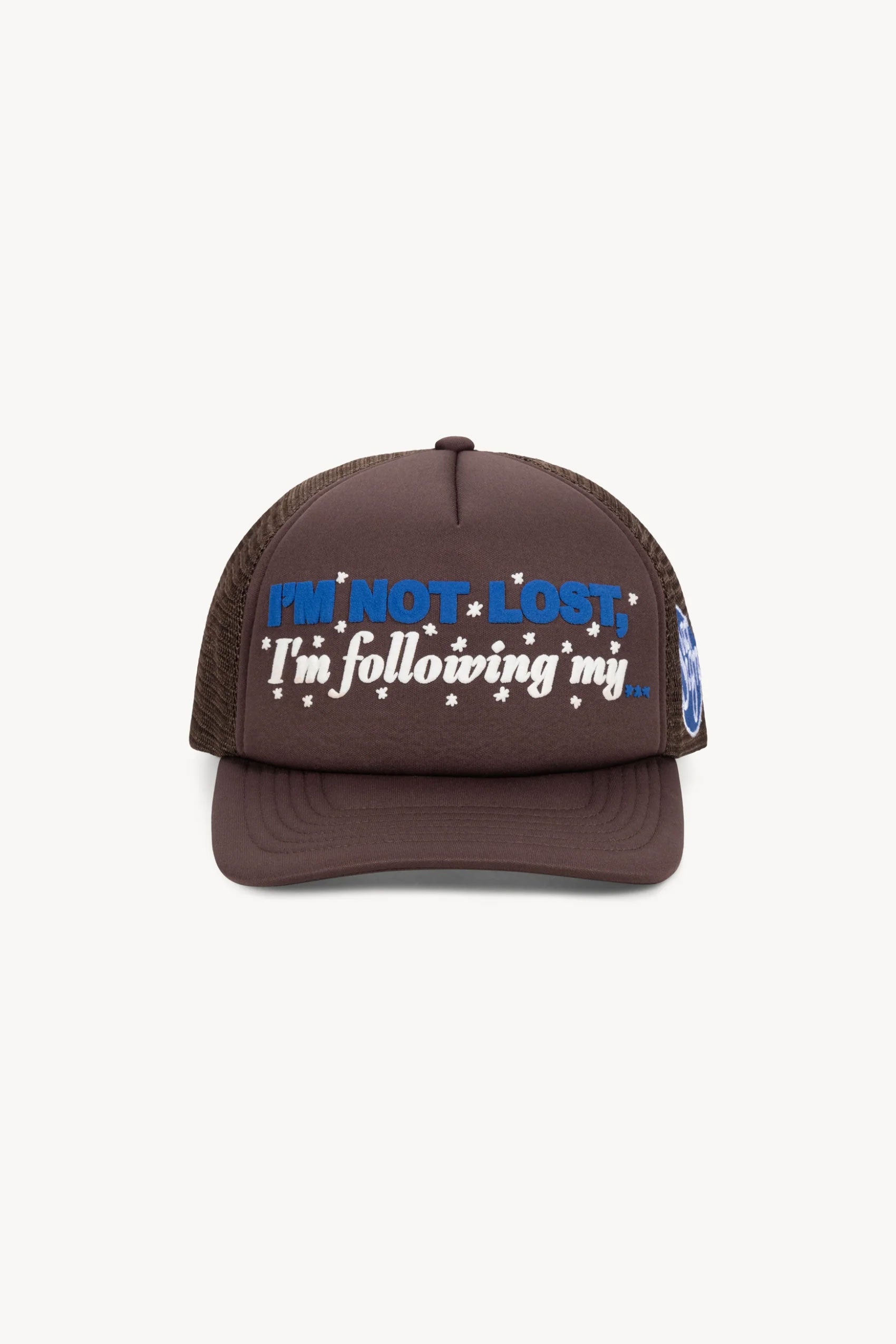 The I'M NOT LOST... TRUCKER CAP BROWN  available online with global shipping, and in PAM Stores Melbourne and Sydney.