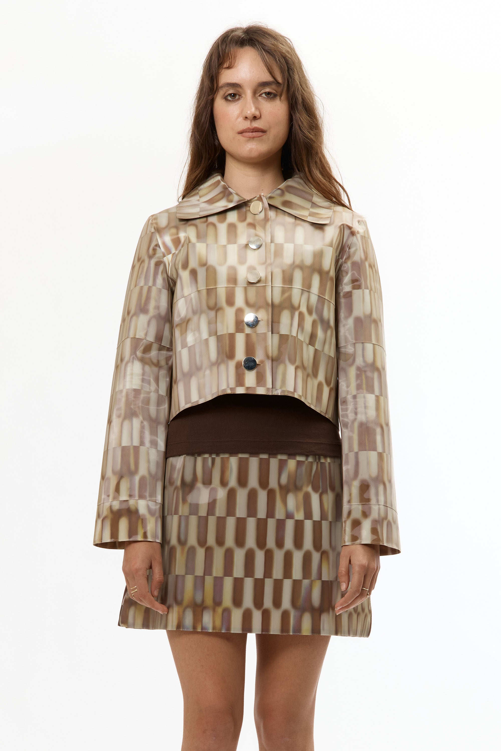 The LENTICULAR CROP BUTTON-UP JACKET TILE BROWN available online with global shipping, and in PAM Stores Melbourne and Sydney.