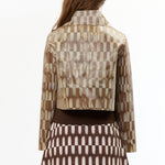 The LENTICULAR CROP BUTTON-UP JACKET TILE BROWN available online with global shipping, and in PAM Stores Melbourne and Sydney.
