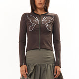 The KOSMIC KISS ZIPPED CARDIGAN available online with global shipping, and in PAM Stores Melbourne and Sydney.