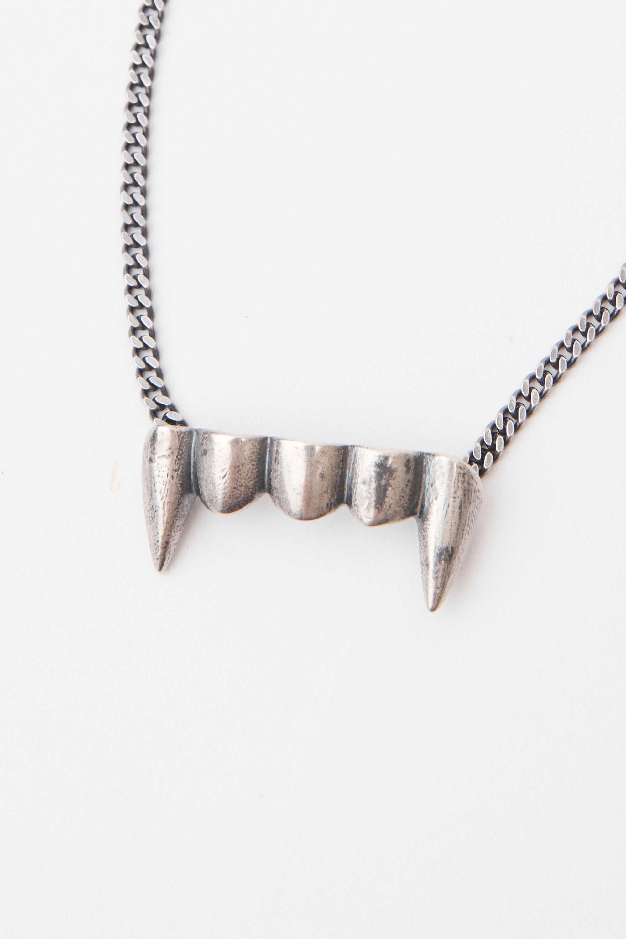 The FANGZ NECKLACE OXIDISED SILVER available online with global shipping, and in PAM Stores Melbourne and Sydney.