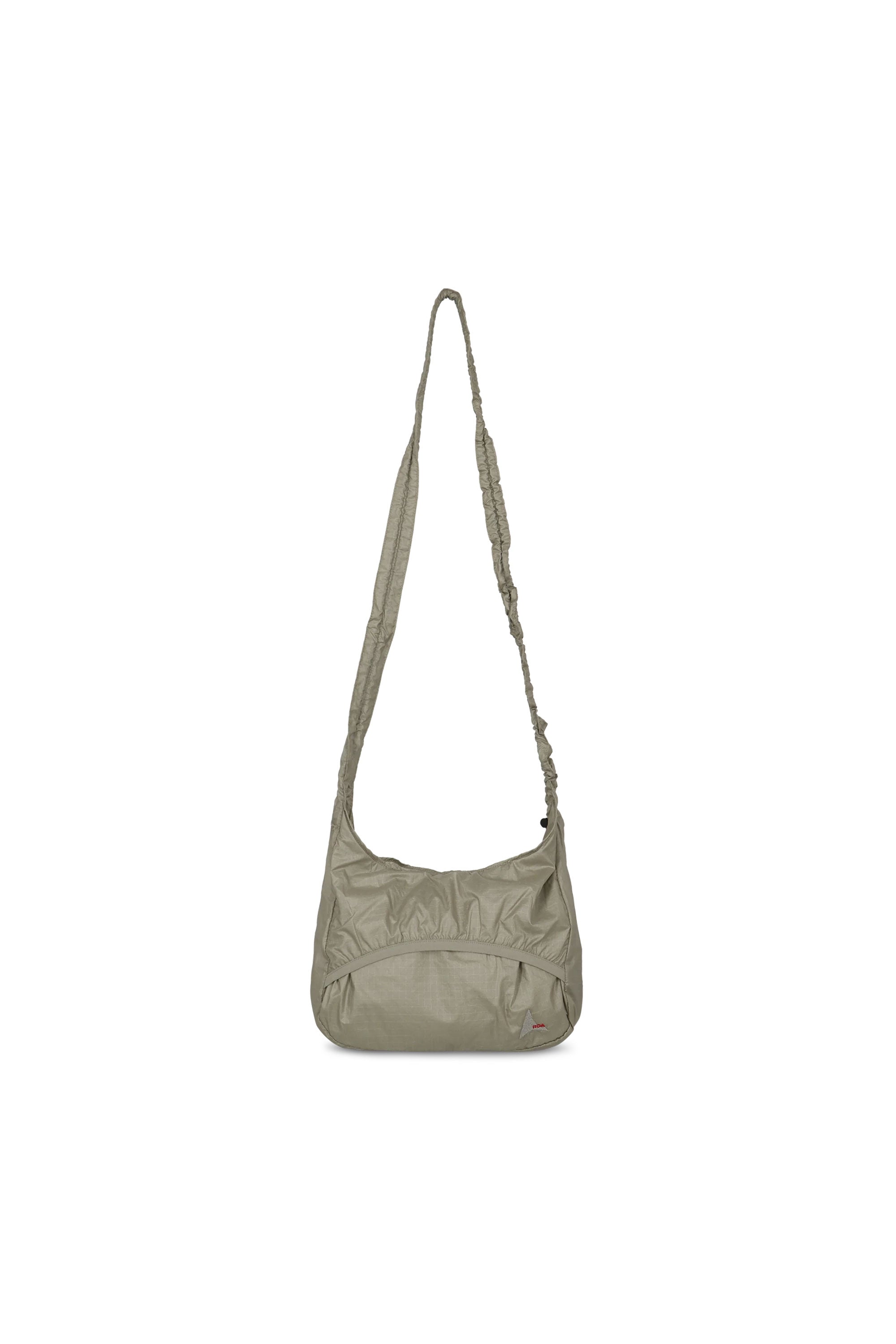 The LAKI Small Packable Knot Bag Sage Green available online with global shipping, and in PAM Stores Melbourne and Sydney.
