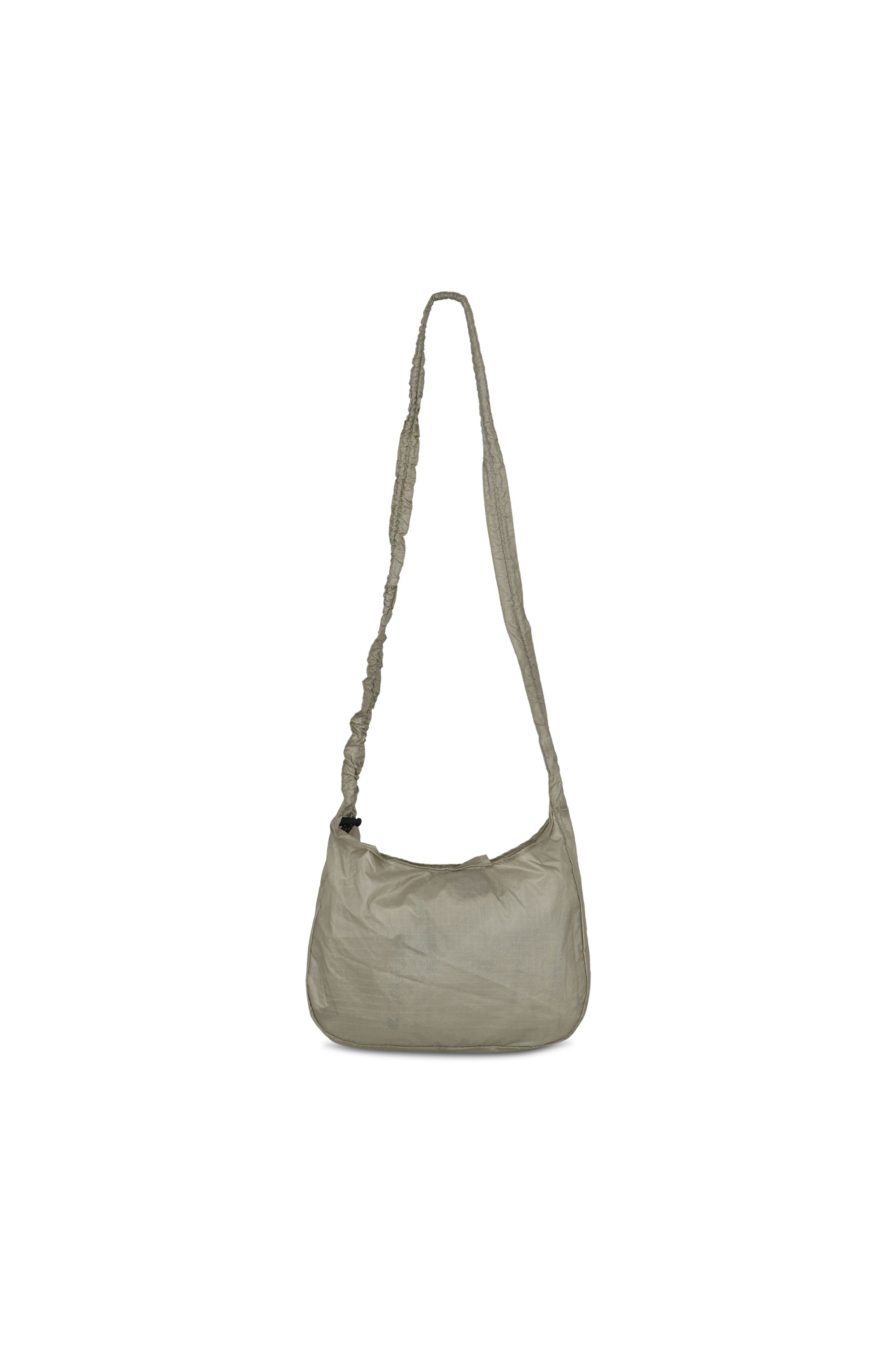 The LAKI Small Packable Knot Bag Sage Green available online with global shipping, and in PAM Stores Melbourne and Sydney.