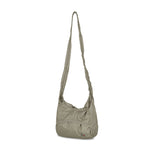 The LAKI Small Packable Knot Bag Sage Green available online with global shipping, and in PAM Stores Melbourne and Sydney.