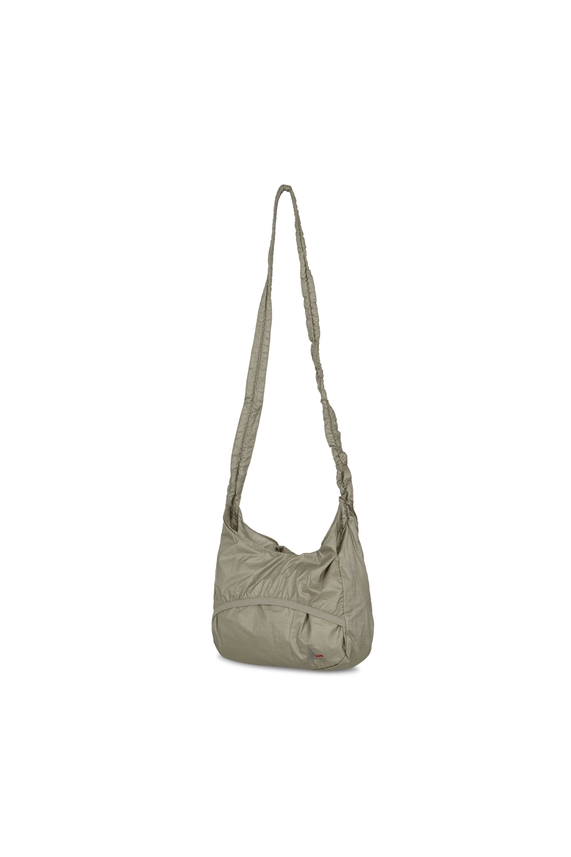 The LAKI Small Packable Knot Bag Sage Green available online with global shipping, and in PAM Stores Melbourne and Sydney.