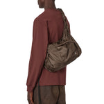 The LAKI Packable Knot Bag Taupe Brown available online with global shipping, and in PAM Stores Melbourne and Sydney.