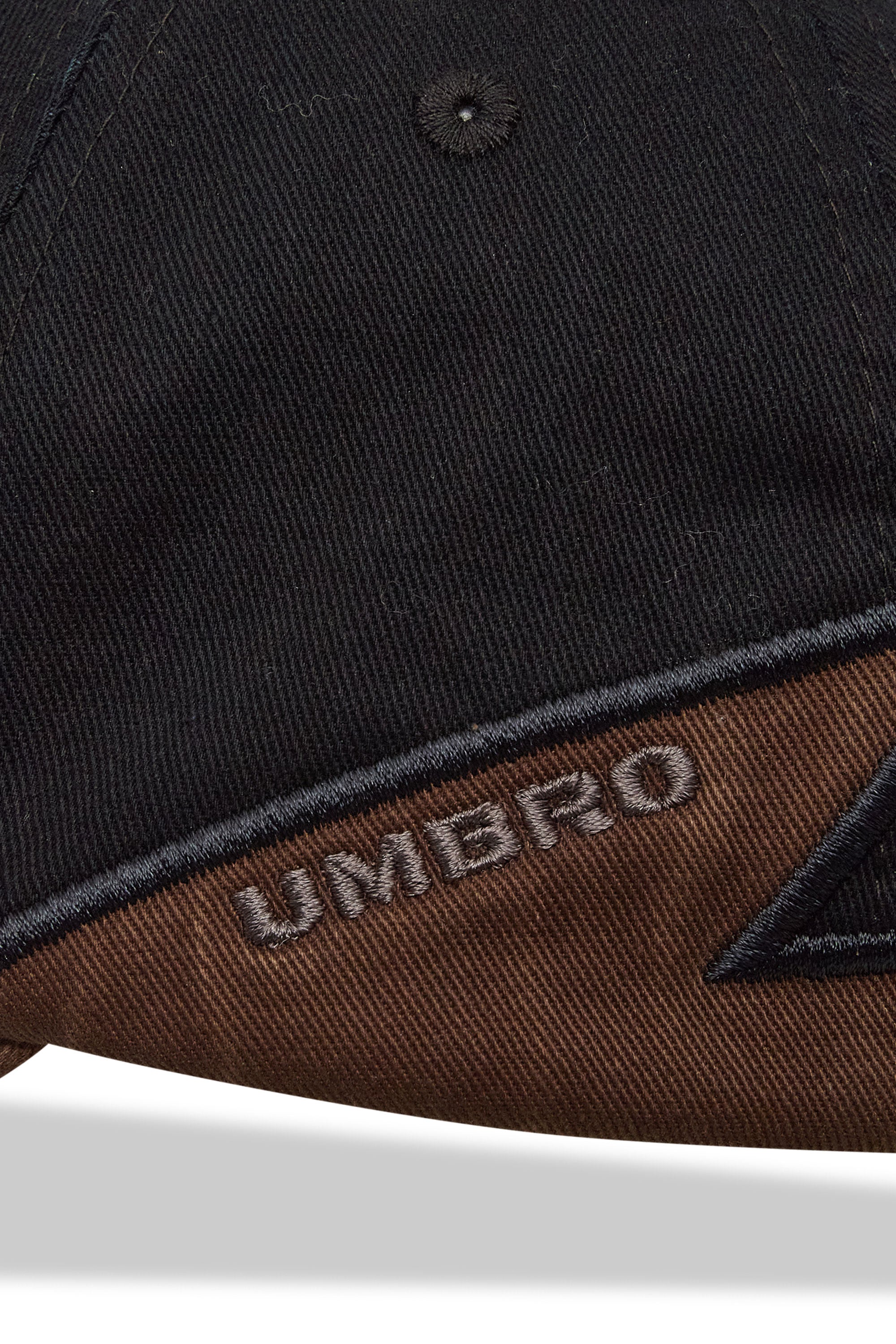 The LAUREL CAP BROWN BLACK available online with global shipping, and in PAM Stores Melbourne and Sydney.