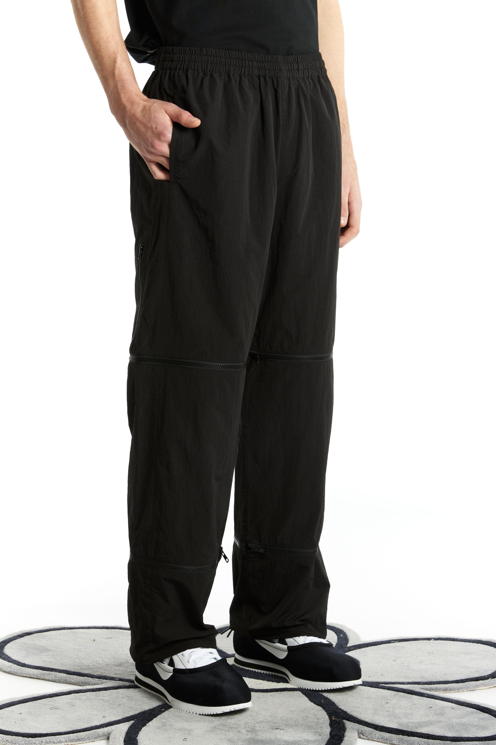 The P.WORLD LIFTED ZIP TRACK PANT  available online with global shipping, and in PAM Stores Melbourne and Sydney.
