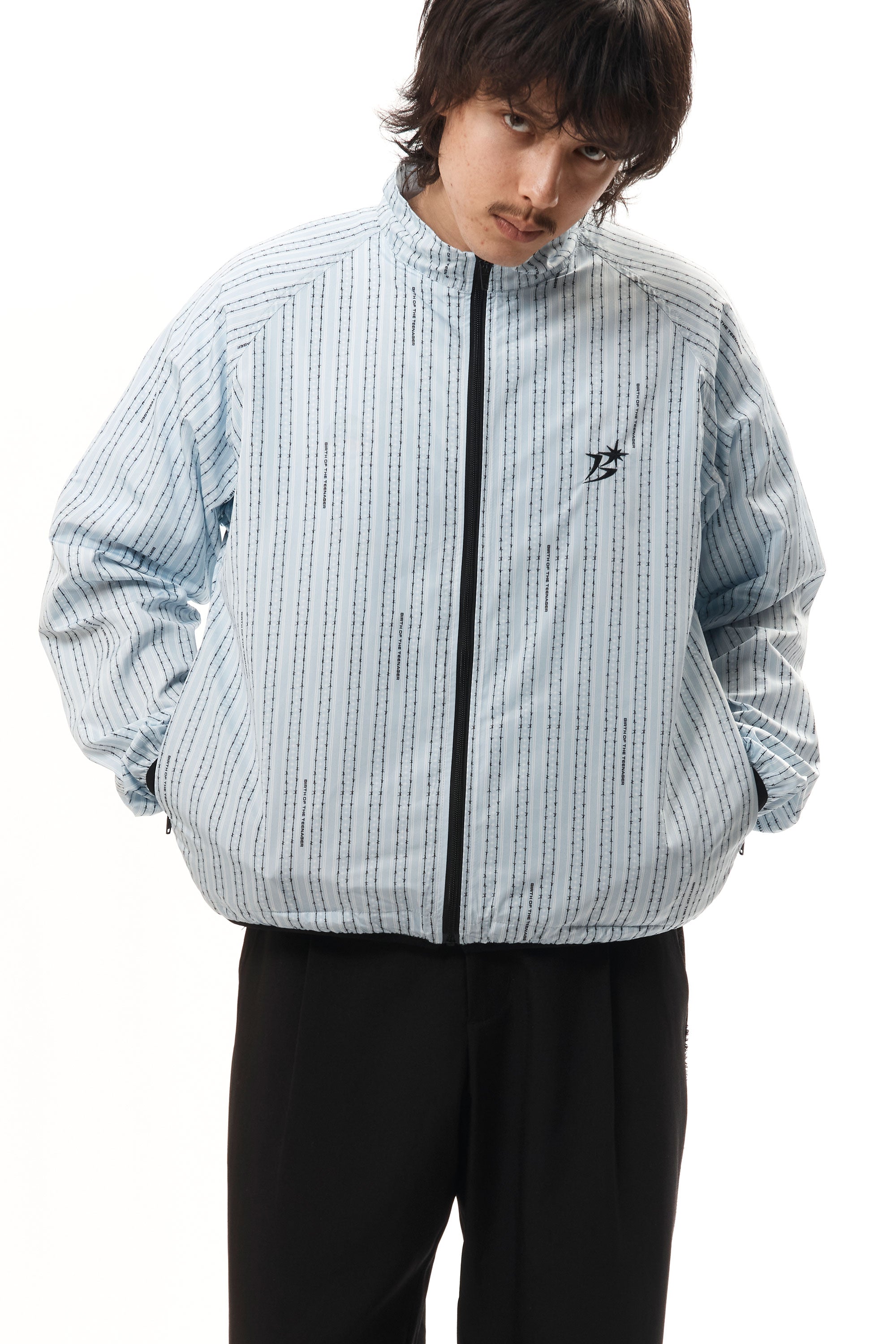 The Lightweight Track Jacket Light Blue available online with global shipping, and in PAM Stores Melbourne and Sydney.