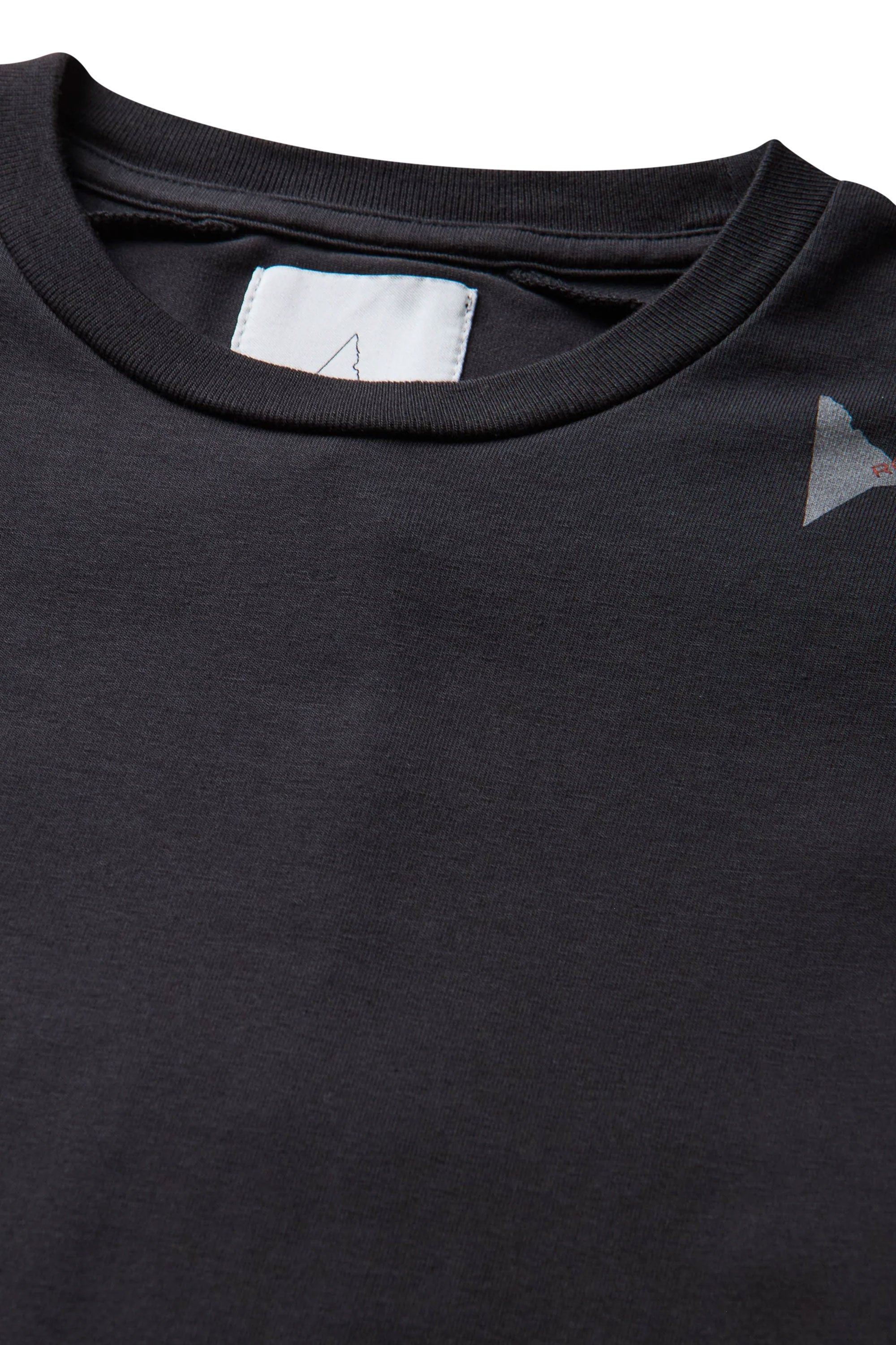 The Logo Baby Tee Washed Black available online with global shipping, and in PAM Stores Melbourne and Sydney.