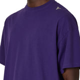 The SS26 Logo T-Shirt Washed Purple available online with global shipping, and in PAM Stores Melbourne and Sydney.