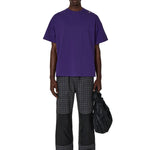 The SS26 Logo T-Shirt Washed Purple available online with global shipping, and in PAM Stores Melbourne and Sydney.
