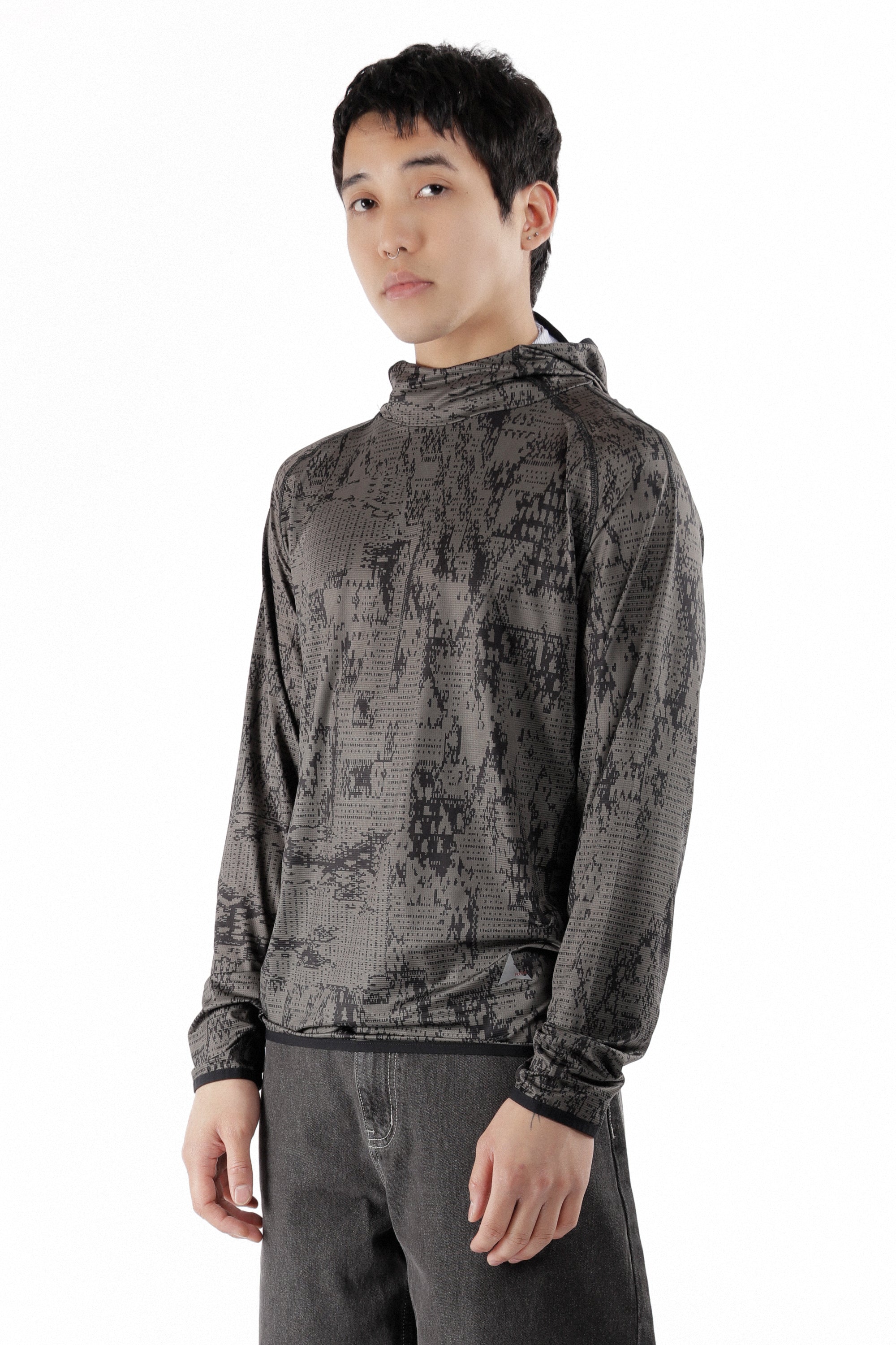The Laki Melted Print Uv Hoodie Olive available online with global shipping, and in PAM Stores Melbourne and Sydney.