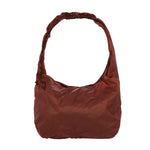 The Laki Packable Knot Bag Dark Red available online with global shipping, and in PAM Stores Melbourne and Sydney.