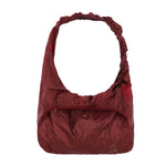 The Laki Packable Knot Bag Dark Red available online with global shipping, and in PAM Stores Melbourne and Sydney.