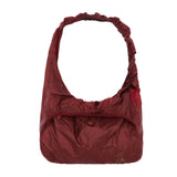 The Laki Packable Knot Bag Dark Red available online with global shipping, and in PAM Stores Melbourne and Sydney.