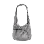The Laki Packable Knot Bag Silver available online with global shipping, and in PAM Stores Melbourne and Sydney.