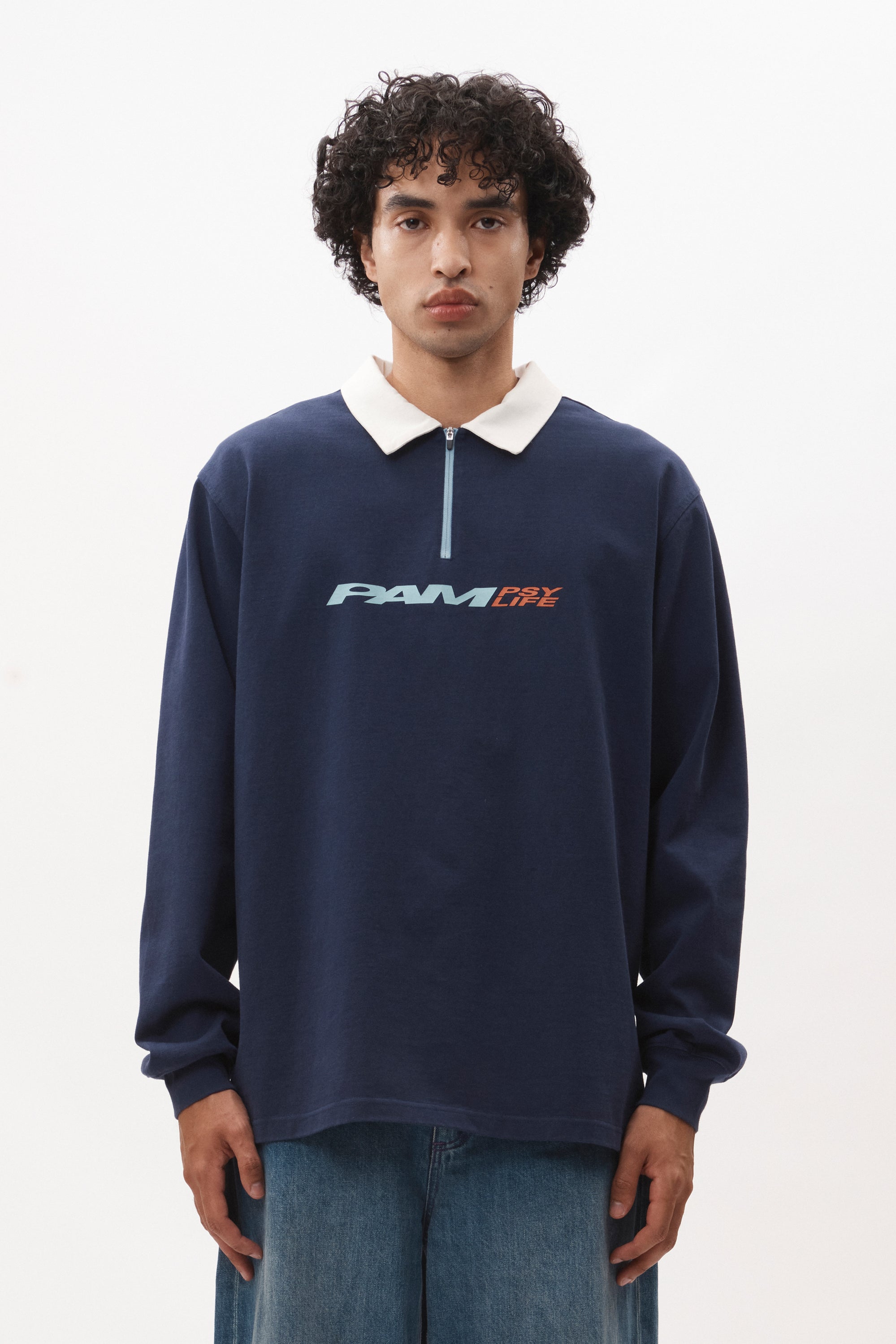 The HOWL HALF ZIP RUGBY TOP available online with global shipping, and in PAM Stores Melbourne and Sydney.