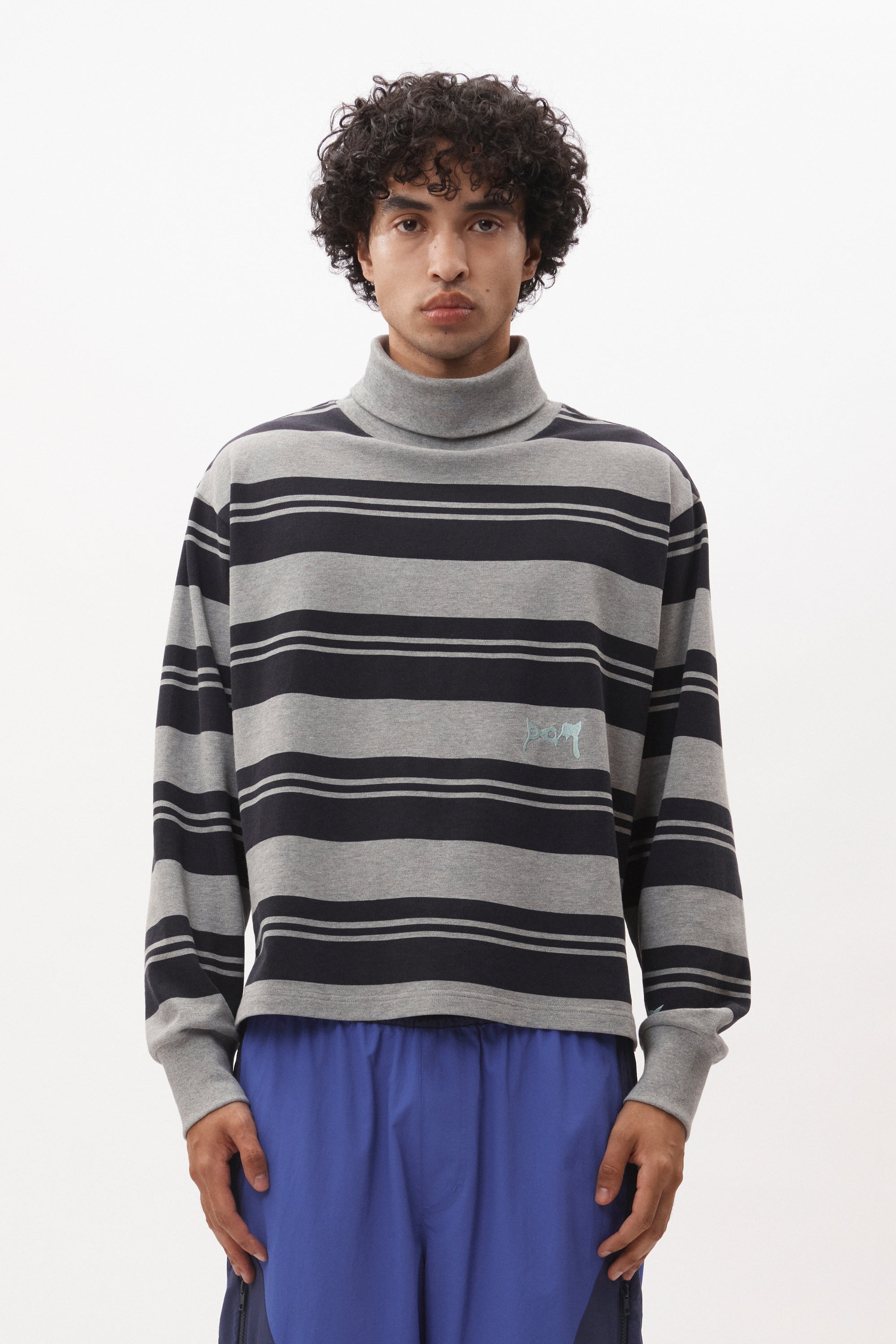 The LINES IN TIME STRIPE MOCK NECK LS TOP available online with global shipping, and in PAM Stores Melbourne and Sydney.