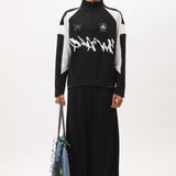 The ANGEL PULLOVER - BLACK WHITE available online with global shipping, and in PAM Stores Melbourne and Sydney.