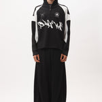 The ANGEL PULLOVER - BLACK WHITE available online with global shipping, and in PAM Stores Melbourne and Sydney.