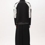 The ANGEL PULLOVER - BLACK WHITE available online with global shipping, and in PAM Stores Melbourne and Sydney.