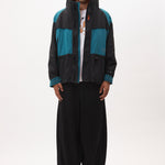 The AUROVILLE SAILING JACKET - BLACK TEAL available online with global shipping, and in PAM Stores Melbourne and Sydney.