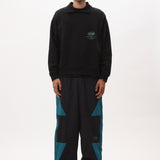The AKTIV-8 TRACKPANT - BLACK TEAL available online with global shipping, and in PAM Stores Melbourne and Sydney.