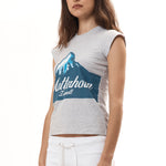 The ZERMATT BABY TEE GREY available online with global shipping, and in PAM Stores Melbourne and Sydney.