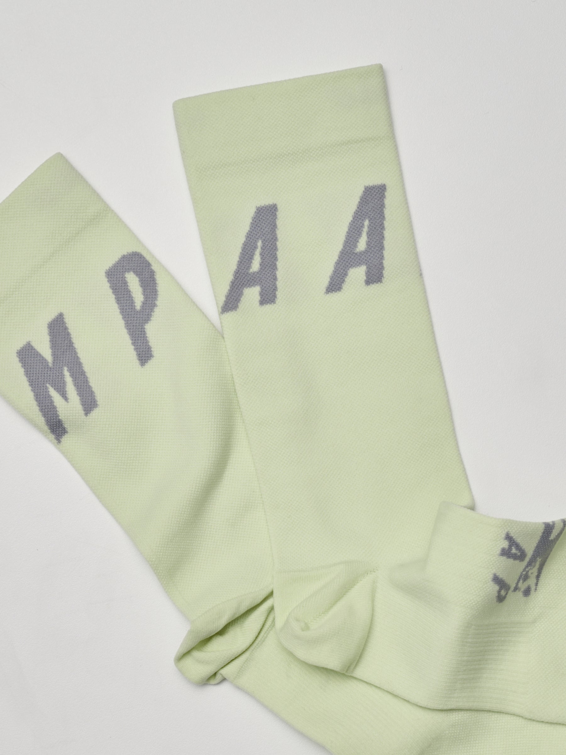 The MAAP x P.A.M. 4.0 Team Sock GLOW / LIME available online with global shipping, and in PAM Stores Melbourne and Sydney.