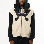 The MAGICAL DOOR 2.0 HOODED ZIP THRU available online with global shipping, and in PAM Stores Melbourne and Sydney.