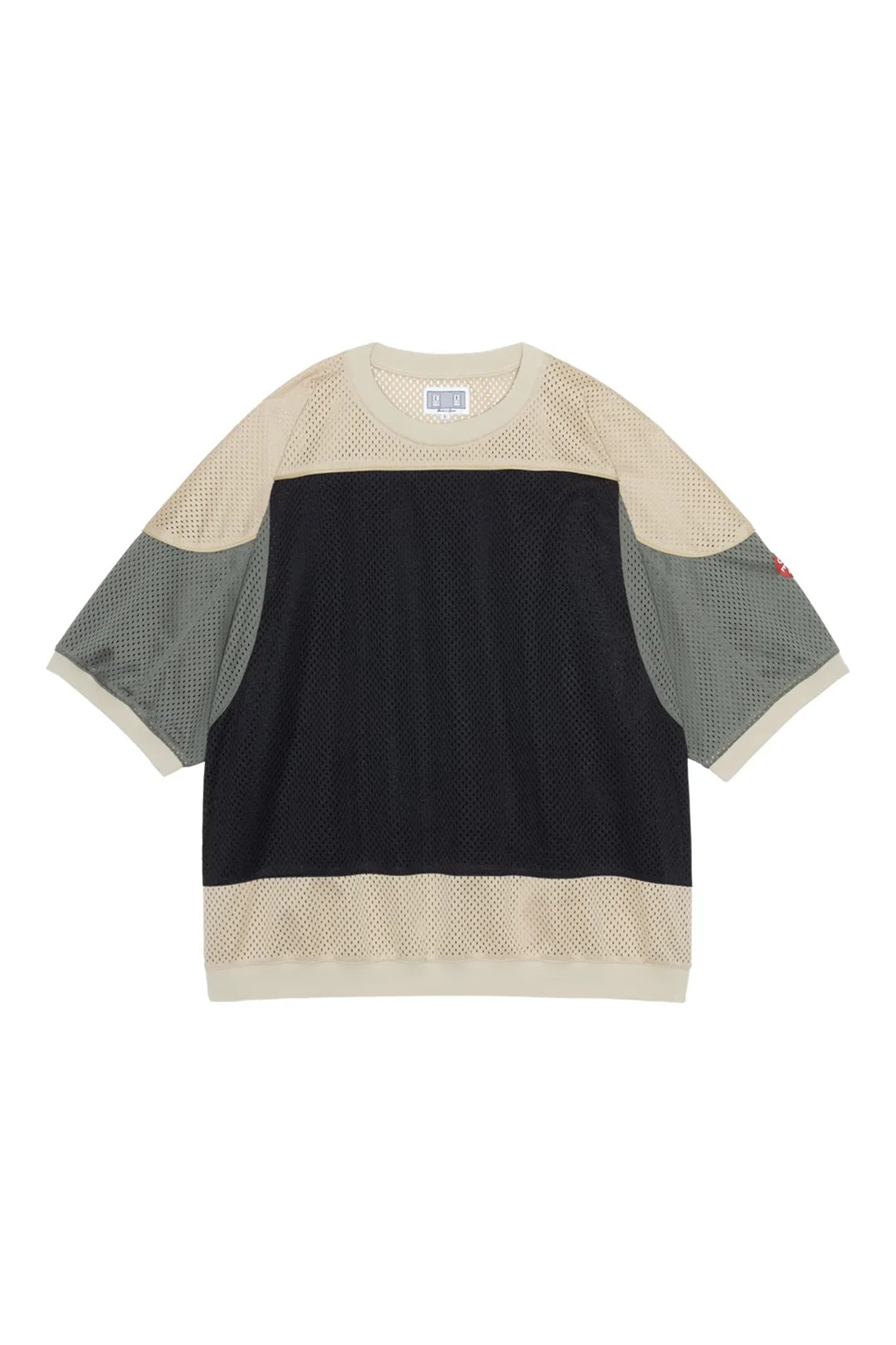 The MD Temporal Distortion MESH SS TOP BEIGE available online with global shipping, and in PAM Stores Melbourne and Sydney.