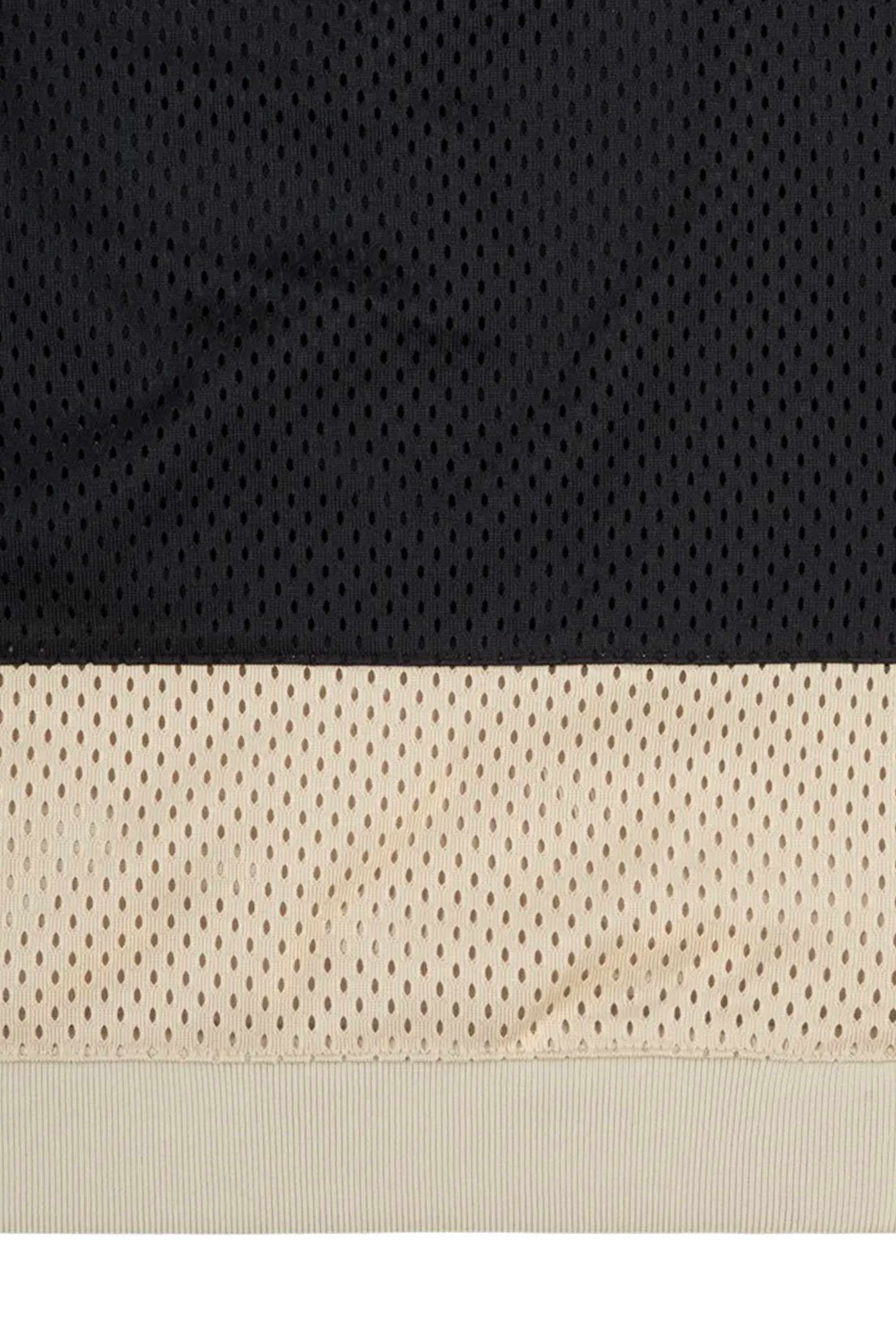 The MD Temporal Distortion MESH SS TOP BEIGE available online with global shipping, and in PAM Stores Melbourne and Sydney.