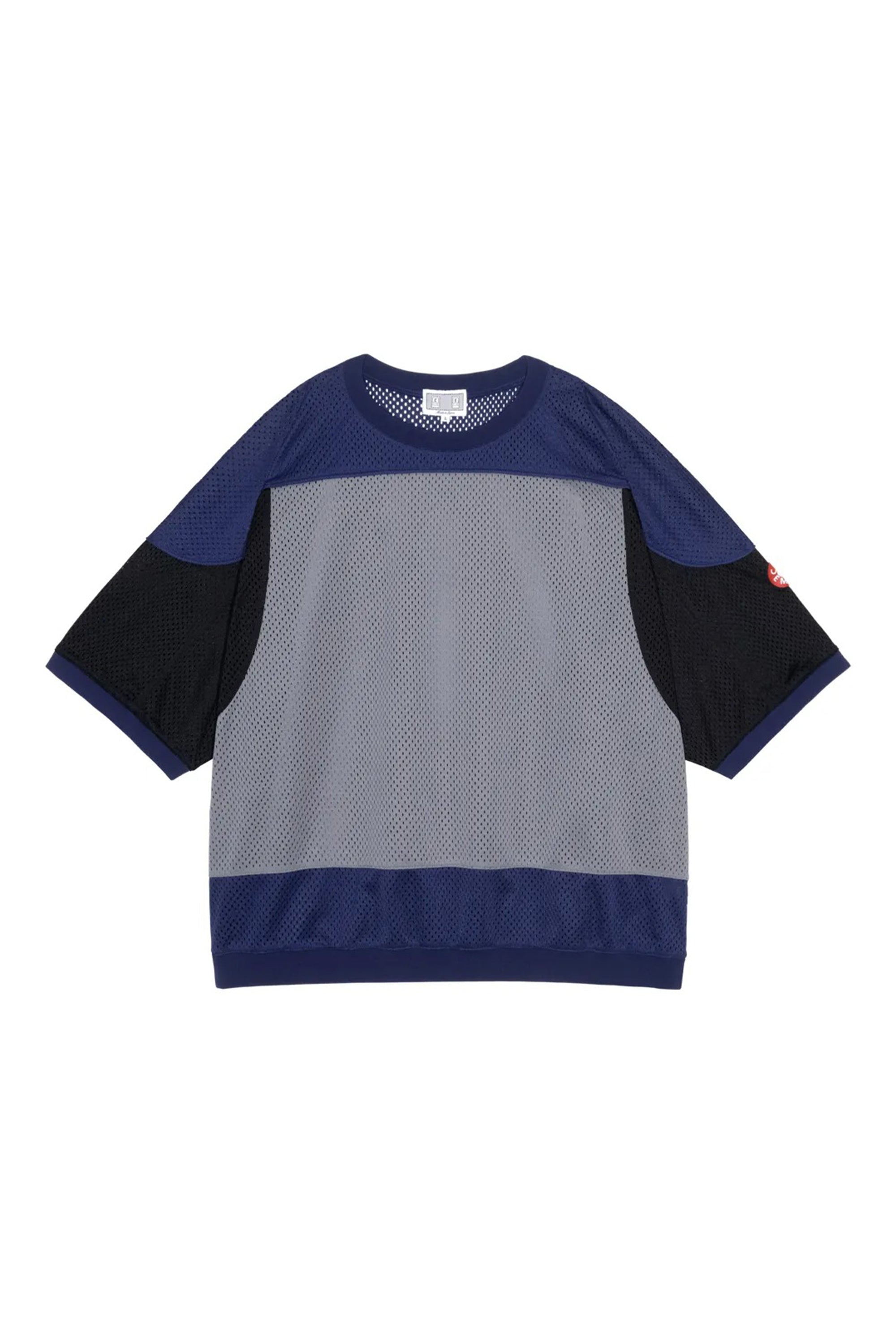 The MD Temporal Distortion MESH SS TOP NAVY available online with global shipping, and in PAM Stores Melbourne and Sydney.