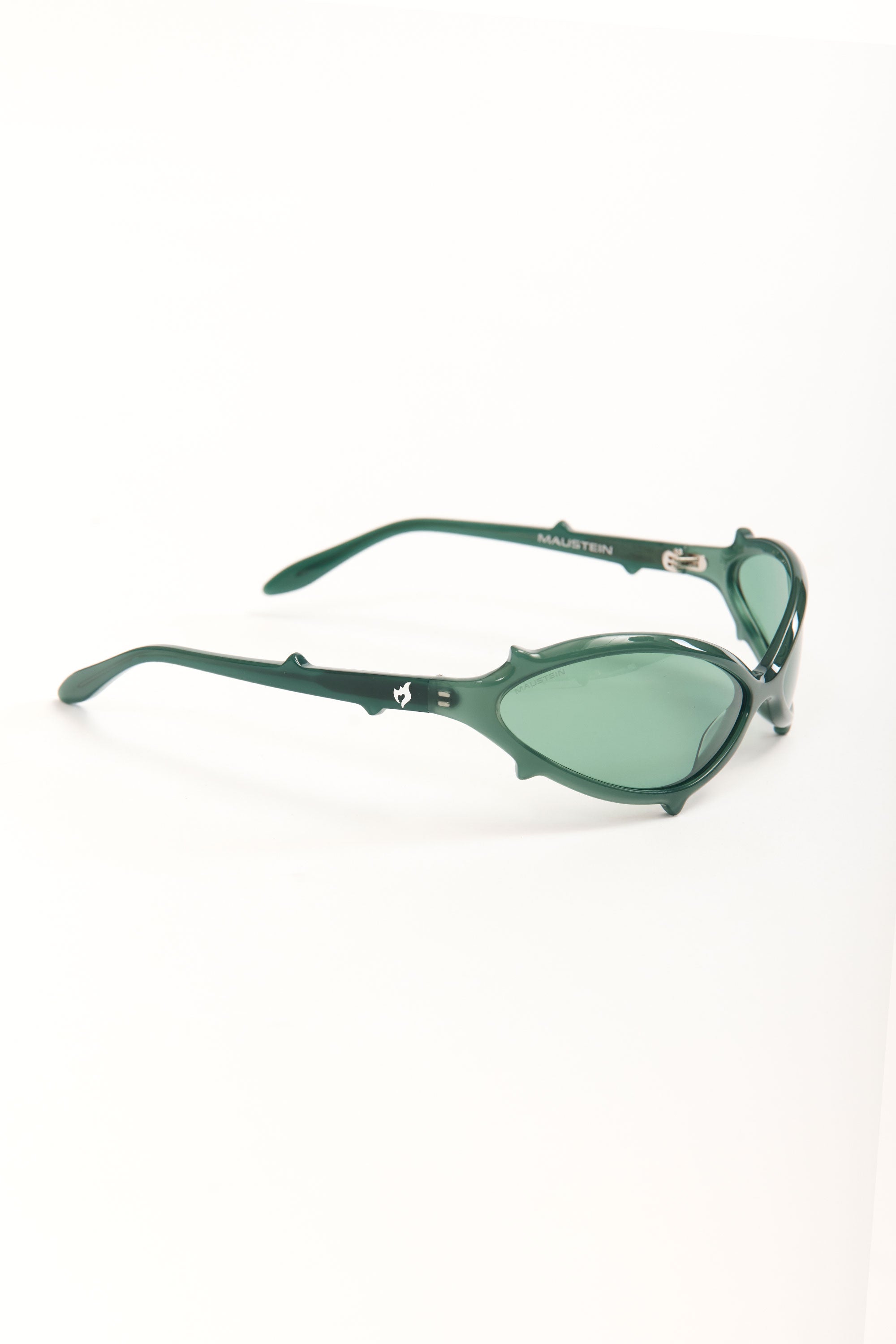 The BABY SPIKE - BOTTLE GREEN WITH GREEN LENS available online with global shipping, and in PAM Stores Melbourne and Sydney.