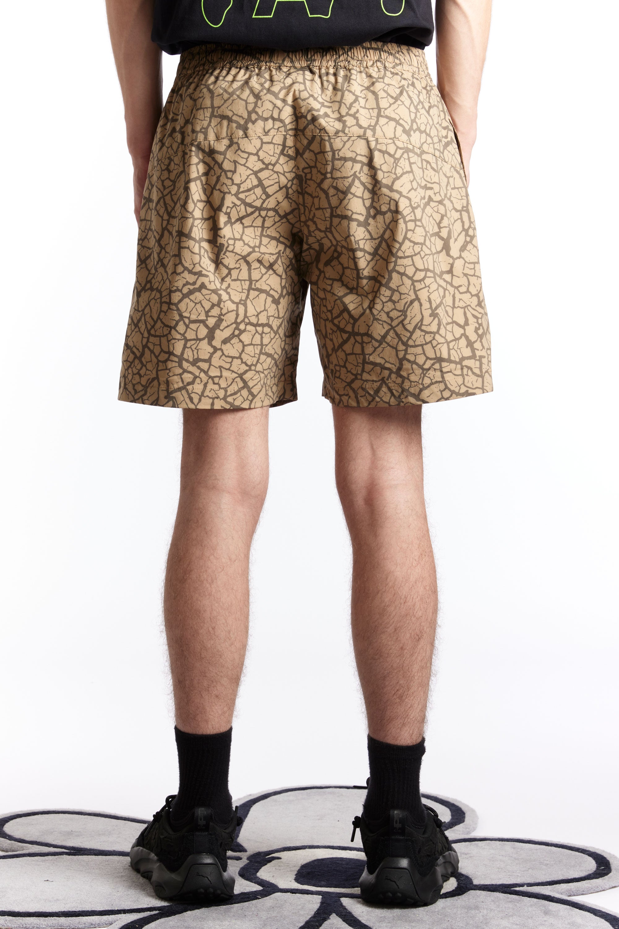 The MUDCRACK SWIM SHORTS  available online with global shipping, and in PAM Stores Melbourne and Sydney.