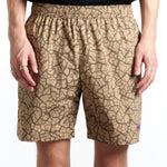 The MUDCRACK SWIM SHORTS  available online with global shipping, and in PAM Stores Melbourne and Sydney.