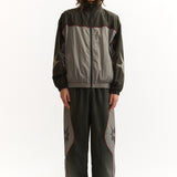 The AGGREGATE TRACK PANTS available online with global shipping, and in PAM Stores Melbourne and Sydney.