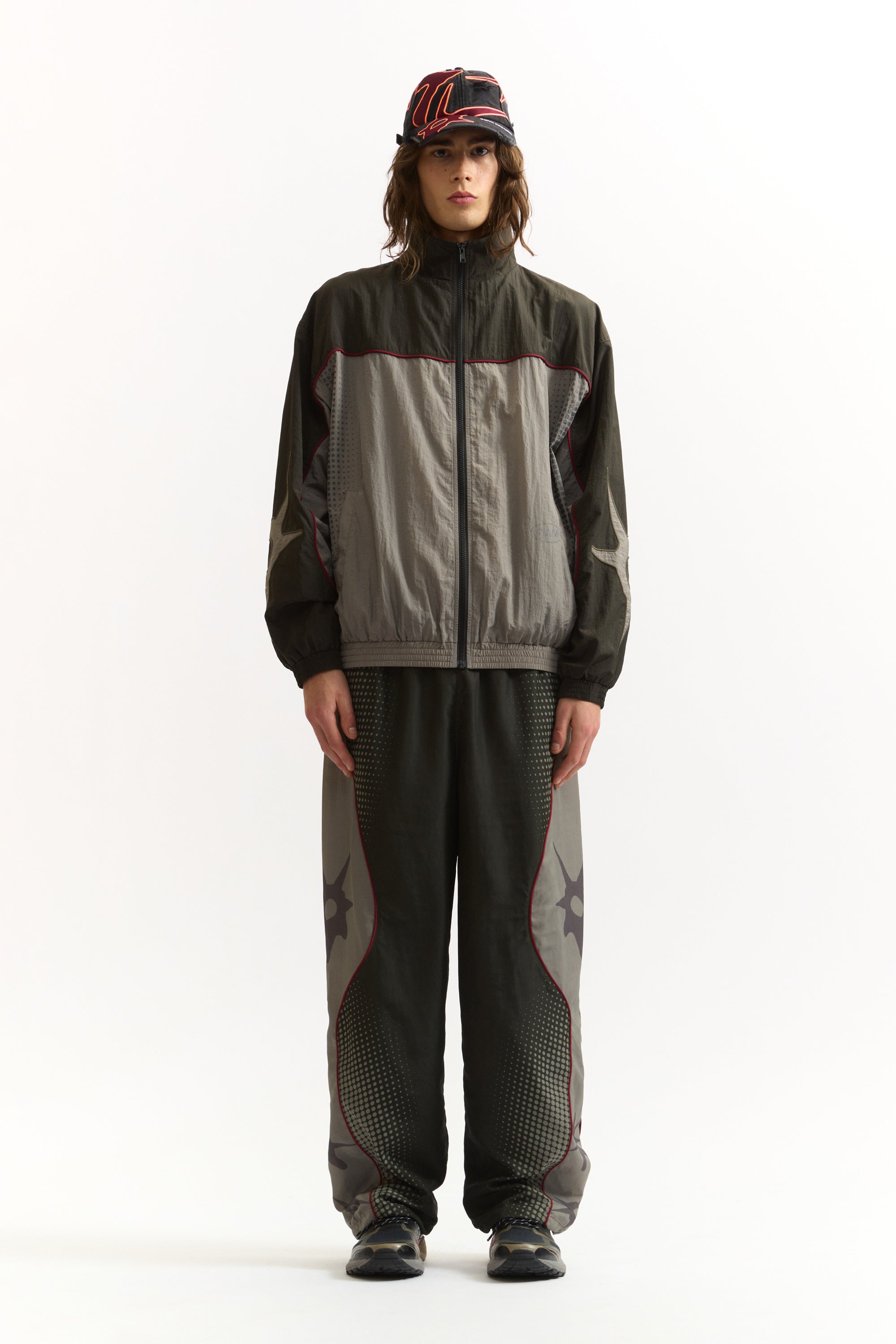 The AGGREGATE TRACK PANTS available online with global shipping, and in PAM Stores Melbourne and Sydney.