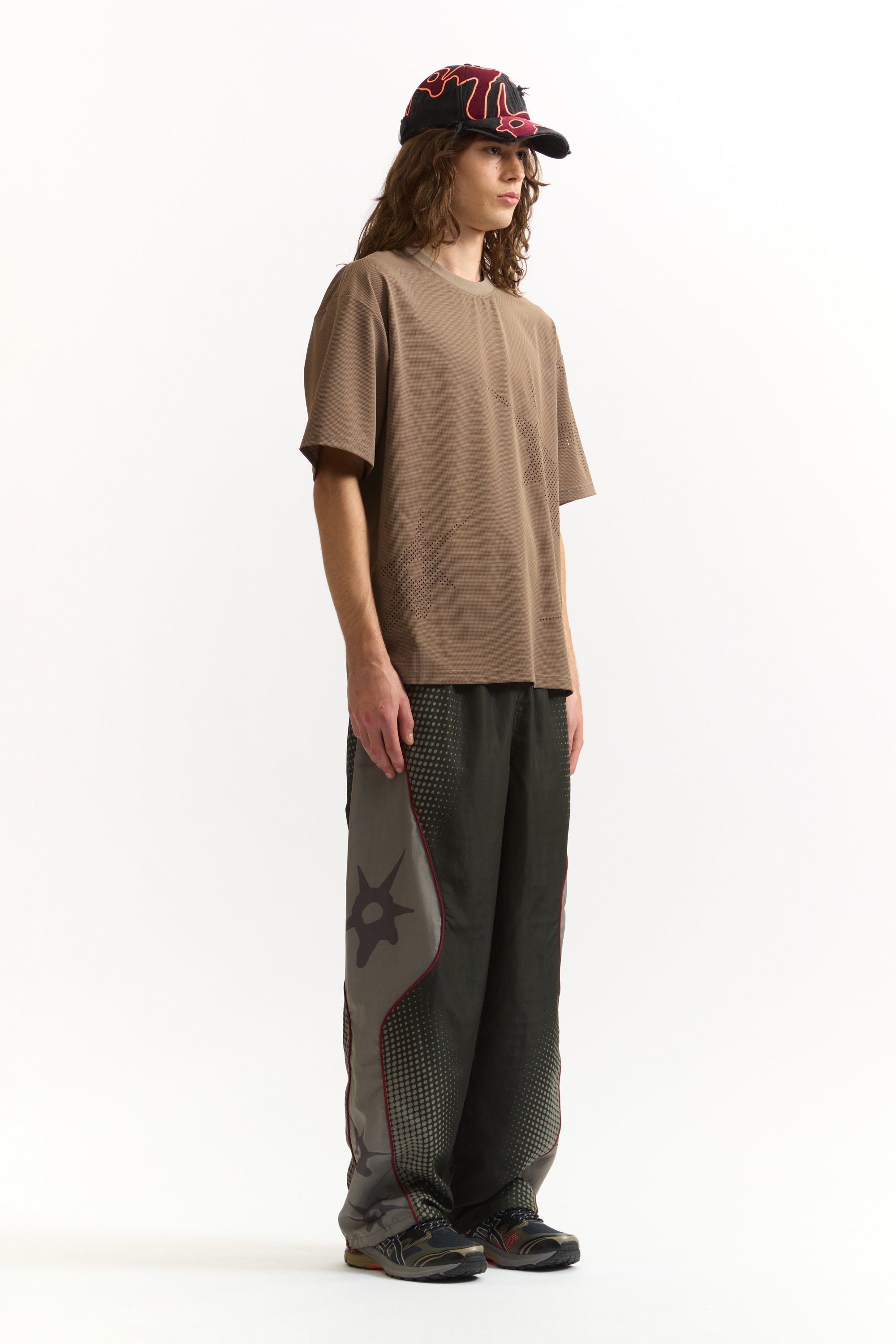The AGGREGATE TRACK PANTS available online with global shipping, and in PAM Stores Melbourne and Sydney.