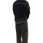 The PG1 KNIT CARIGAN NAVY available online with global shipping, and in PAM Stores Melbourne and Sydney.