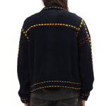 The PG1 KNIT CARIGAN NAVY available online with global shipping, and in PAM Stores Melbourne and Sydney.