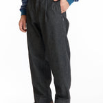 The SS26 DENIM TUCK PANTS BLACK available online with global shipping, and in PAM Stores Melbourne and Sydney.