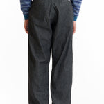 The SS26 DENIM TUCK PANTS BLACK available online with global shipping, and in PAM Stores Melbourne and Sydney.