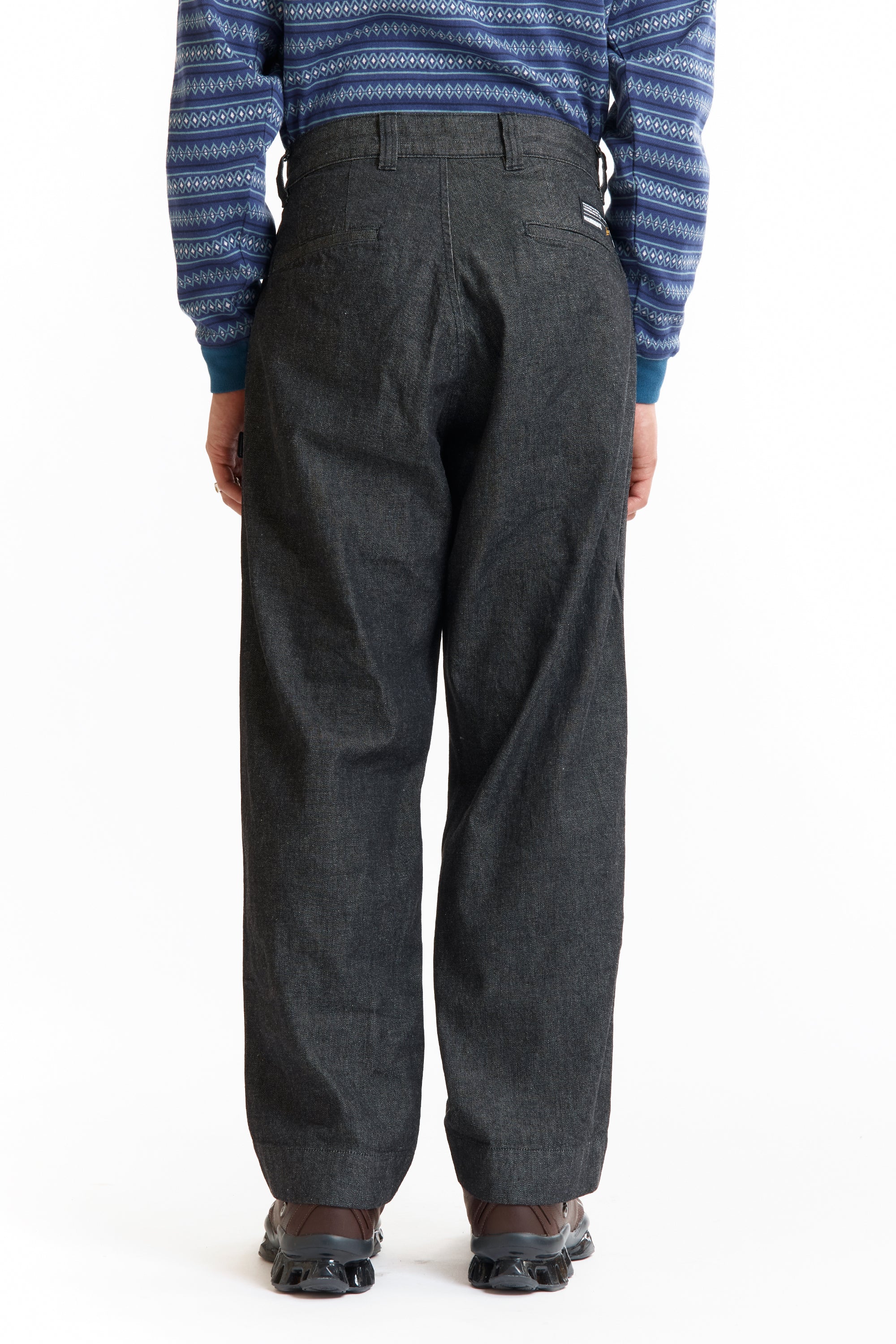 The SS26 DENIM TUCK PANTS BLACK available online with global shipping, and in PAM Stores Melbourne and Sydney.