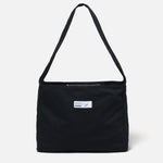 The HBT NEWSPAPER BAG BLACK available online with global shipping, and in PAM Stores Melbourne and Sydney.