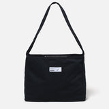 The HBT NEWSPAPER BAG BLACK available online with global shipping, and in PAM Stores Melbourne and Sydney.