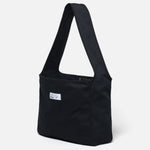The HBT NEWSPAPER BAG BLACK available online with global shipping, and in PAM Stores Melbourne and Sydney.
